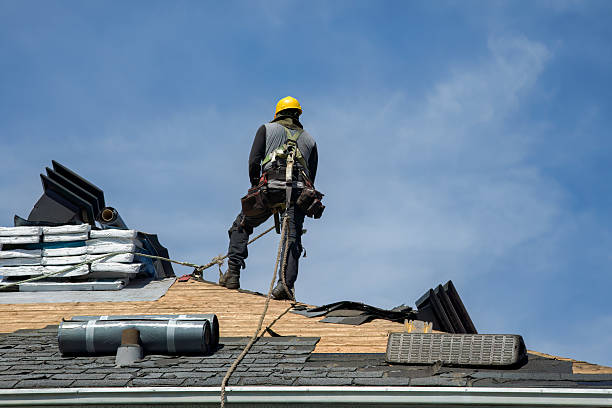 Professional Roofing technician working in West Sand Lake, NY